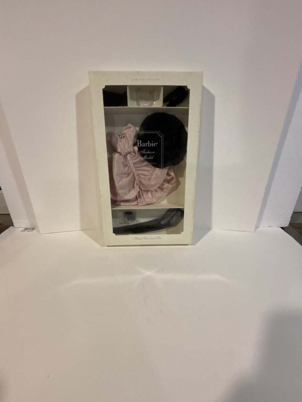 Barbie Blush Becomes Her Accessory
